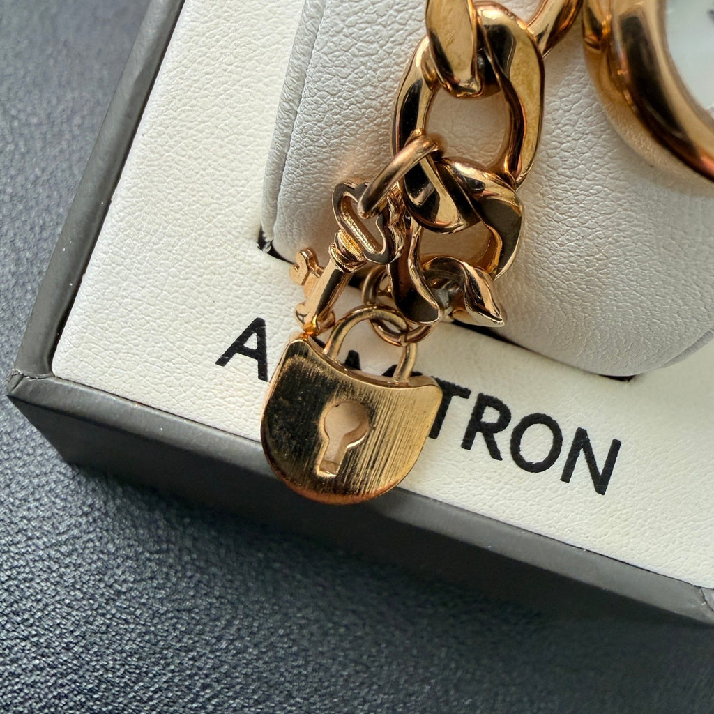 MSRP $90 Armitron 75/5620RG Rose Gold Key & Lock Charm Ladies Watch New Battery