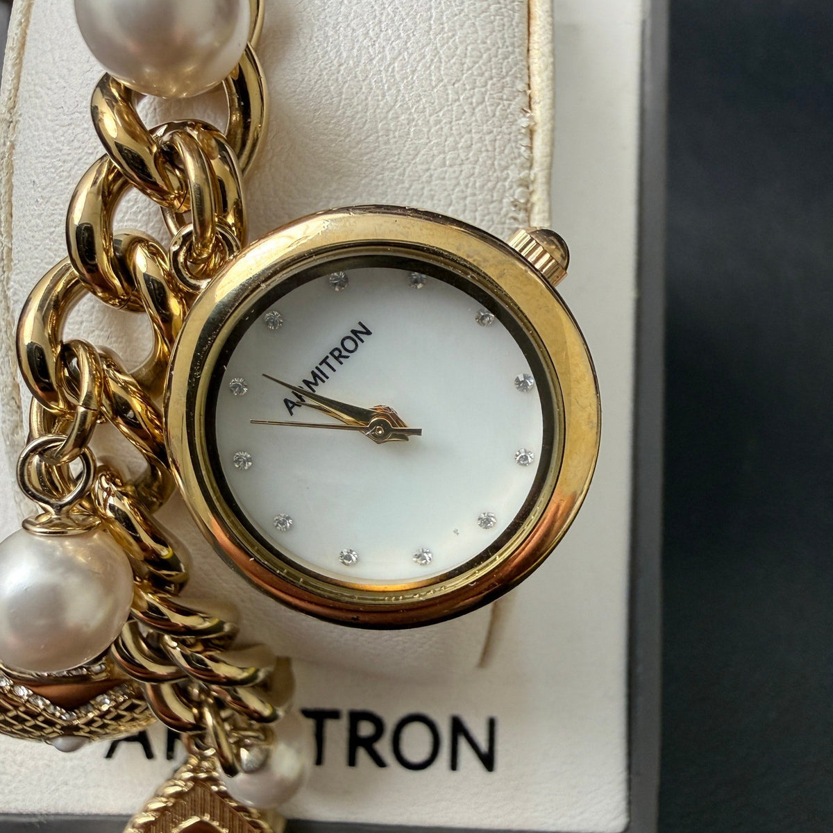 MSRP $100 Armitron 75/5684GP Women's Gold Tone Charm Dangle Bracelet Watch New