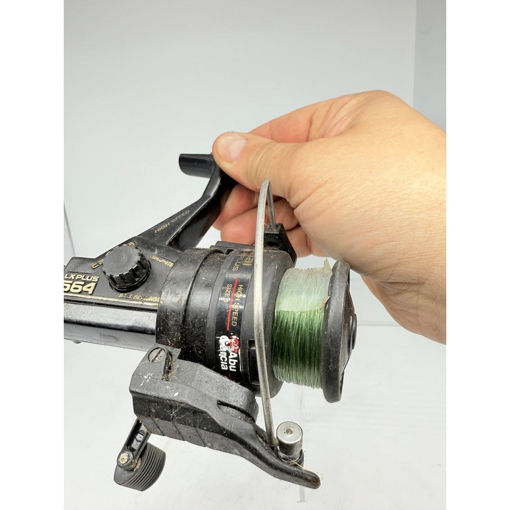Vtg Abu Garcia Cardinal LX Plus 564 Graphite Spinning Fishing Reel Thailand