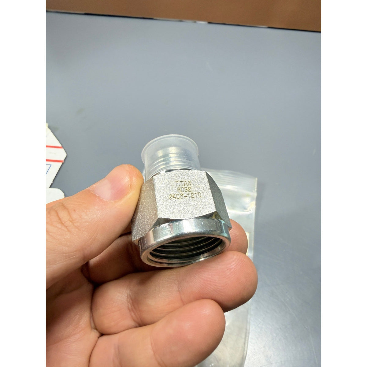 Titan 2406-12-10 Tube Expander-Reducer 3/4" JIC Female x 5/8" JIC Male (1 1/16