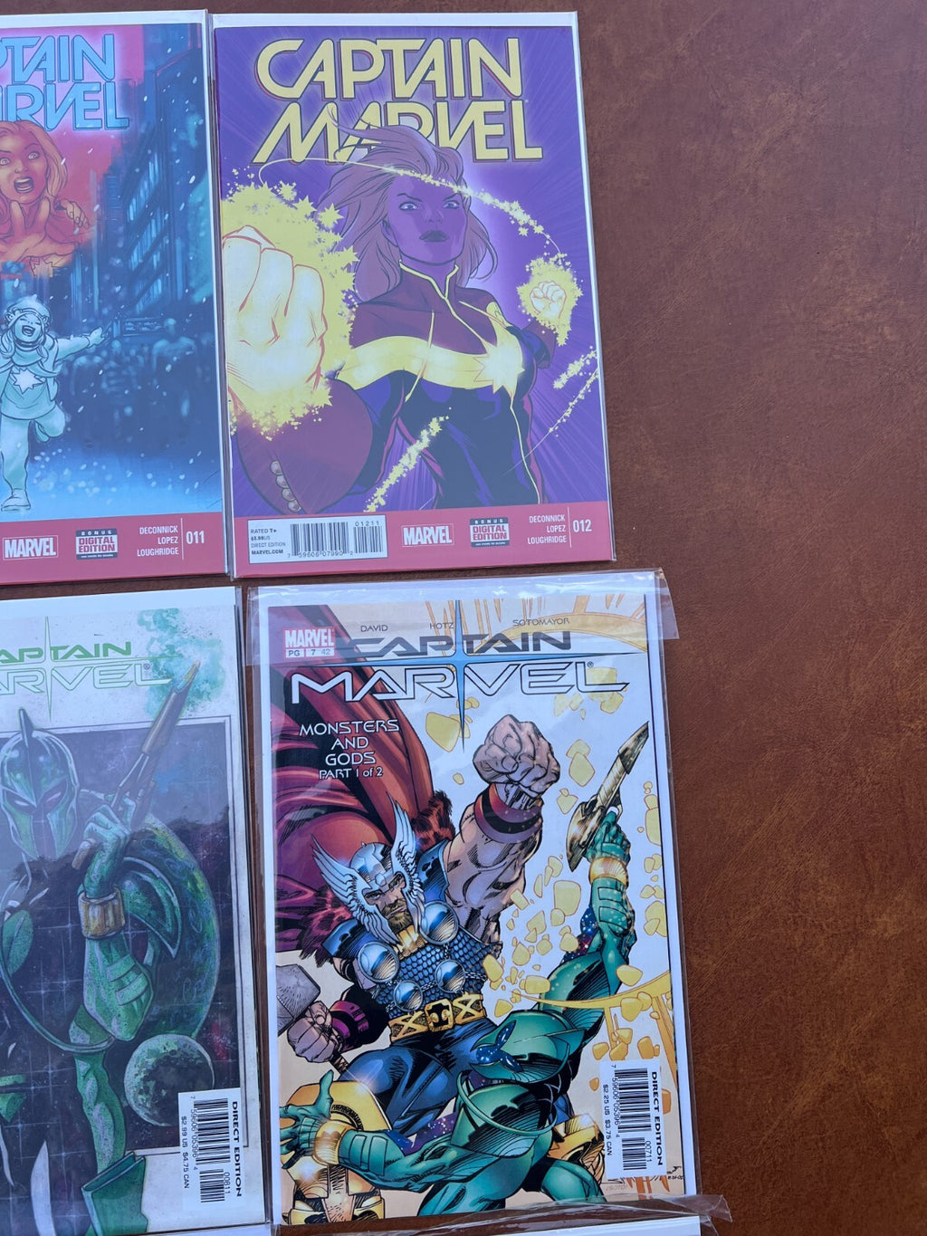 Lot of 9 Captain Marvel #002,011,012,15,37,42,43,45,4 Comic Books