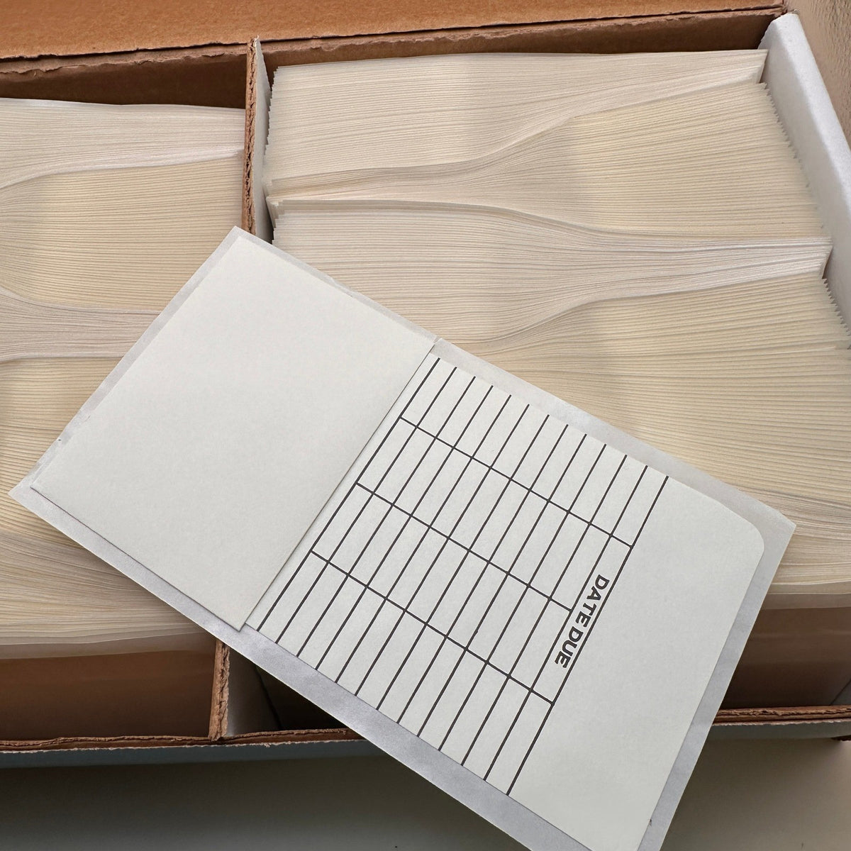 Pack of 500 Kapco High Back Peel and Press Date Due Library Pocket with Grid 3