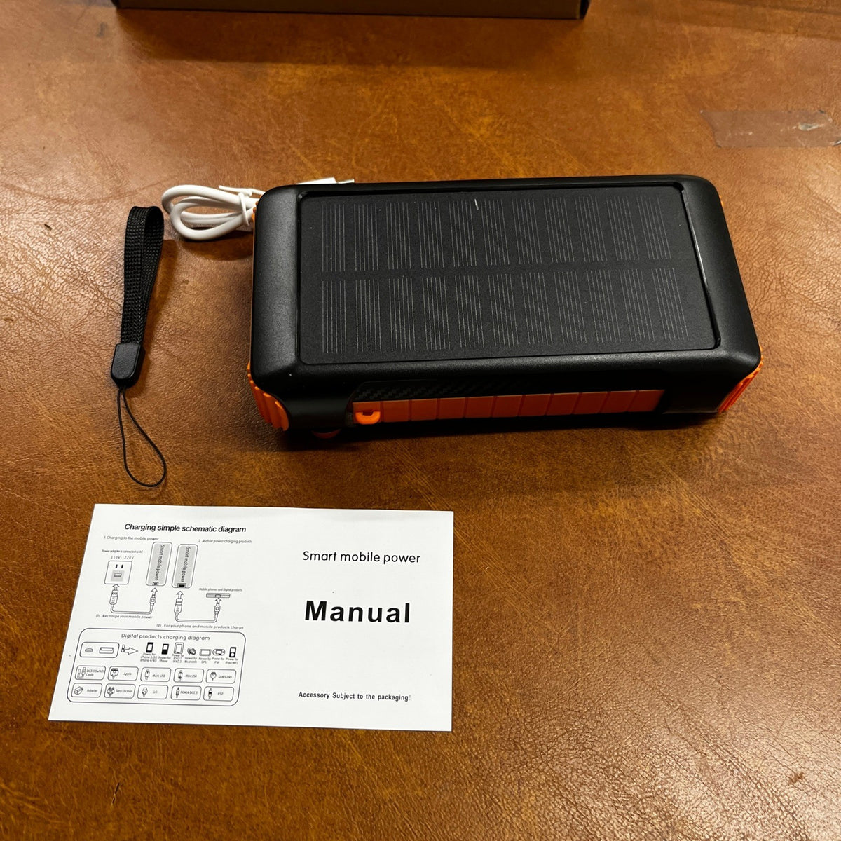 Solar Power Bank 20000mAh Orange Built in Hand Crank 4 Cables 22.5W Fast Charge