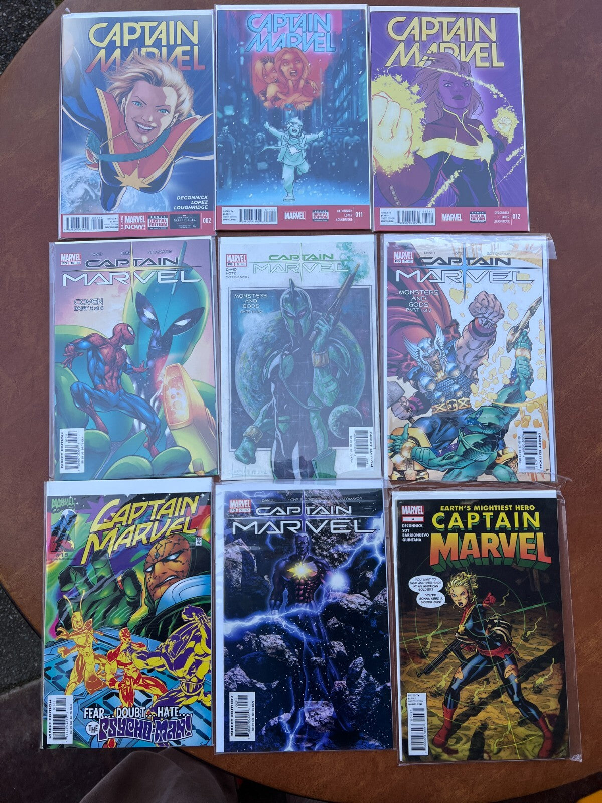 Lot of 9 Captain Marvel #002,011,012,15,37,42,43,45,4 Comic Books