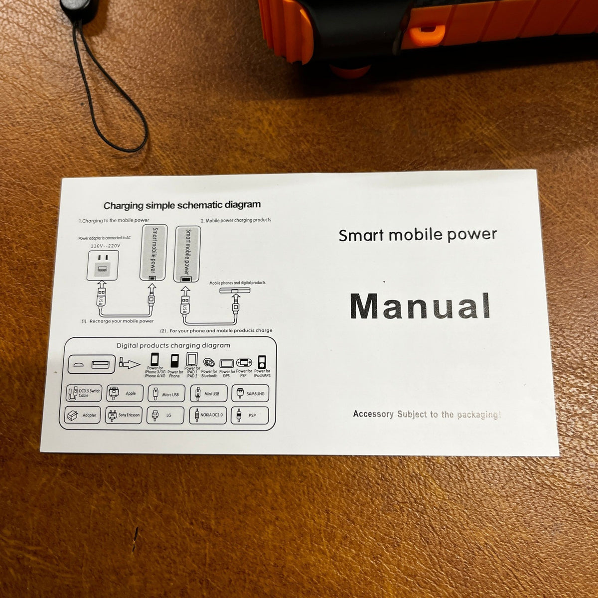 Solar Power Bank 20000mAh Orange Built in Hand Crank 4 Cables 22.5W Fast Charge