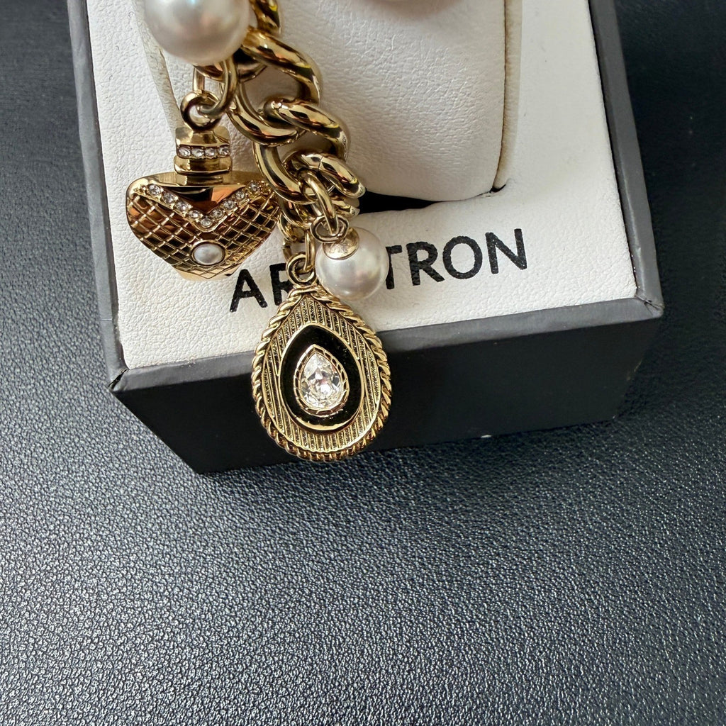MSRP $100 Armitron 75/5684GP Women's Gold Tone Charm Dangle Bracelet Watch New