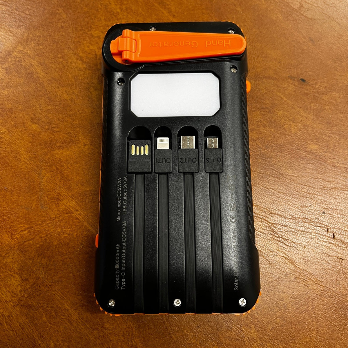 Solar Power Bank 20000mAh Orange Built in Hand Crank 4 Cables 22.5W Fast Charge