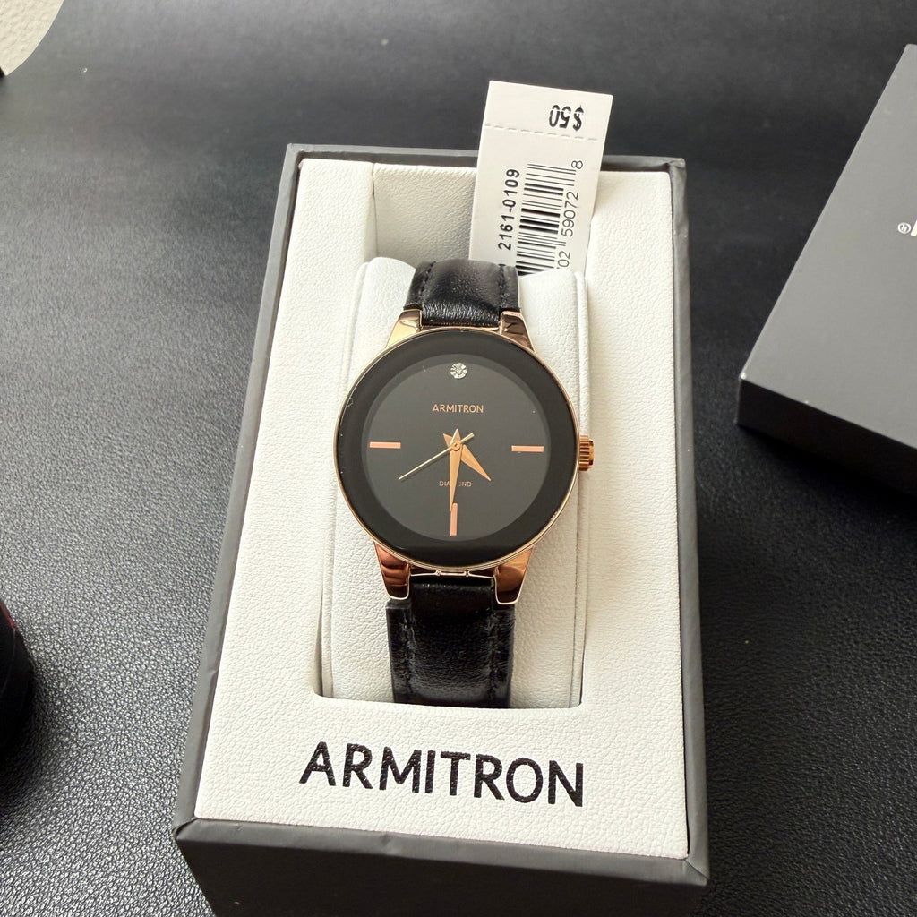 MSRP $50 Armitron 75/5410RG Rose Gold Womens Diamond Black Dial Watch New Batt